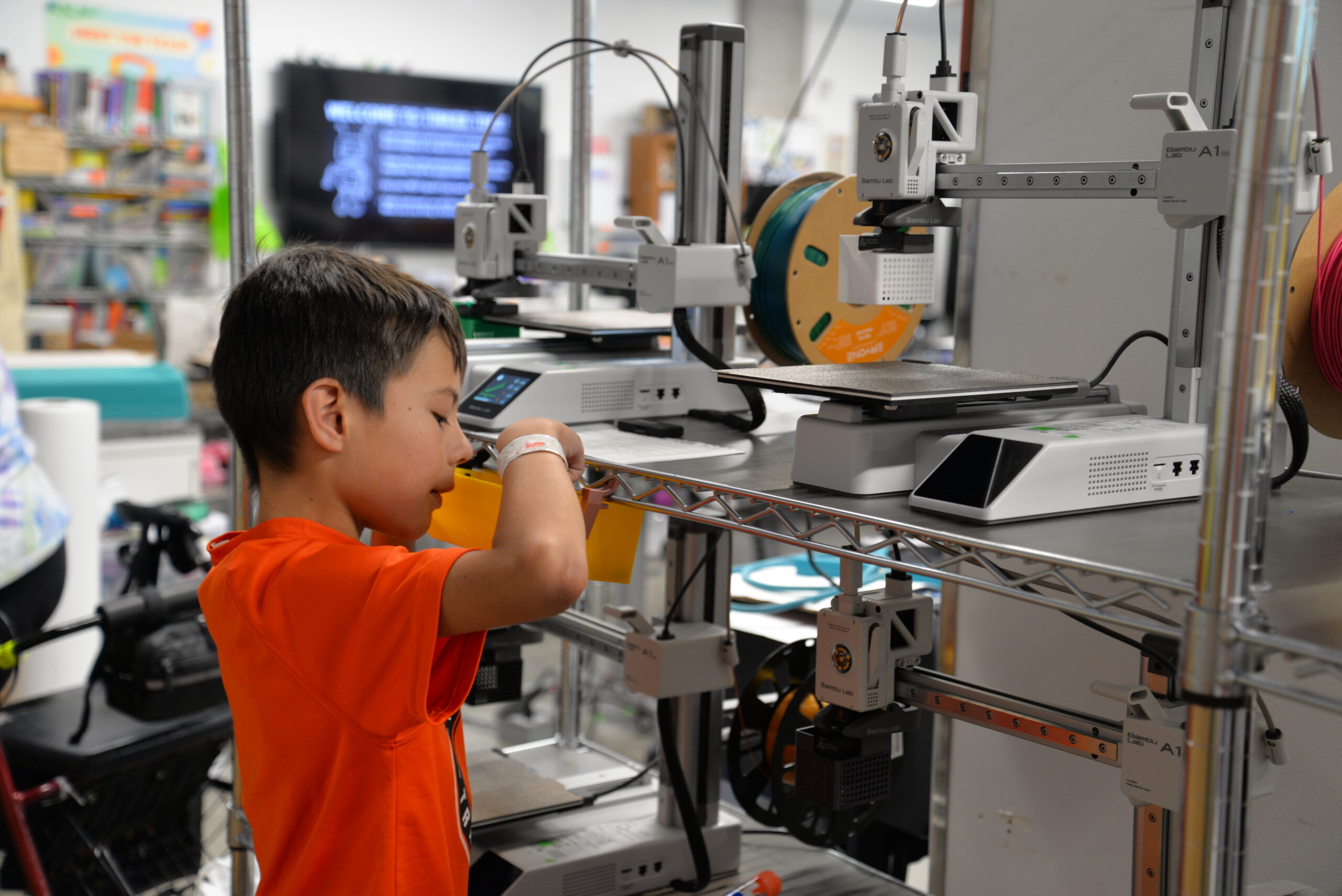 A student using a coin creation tool